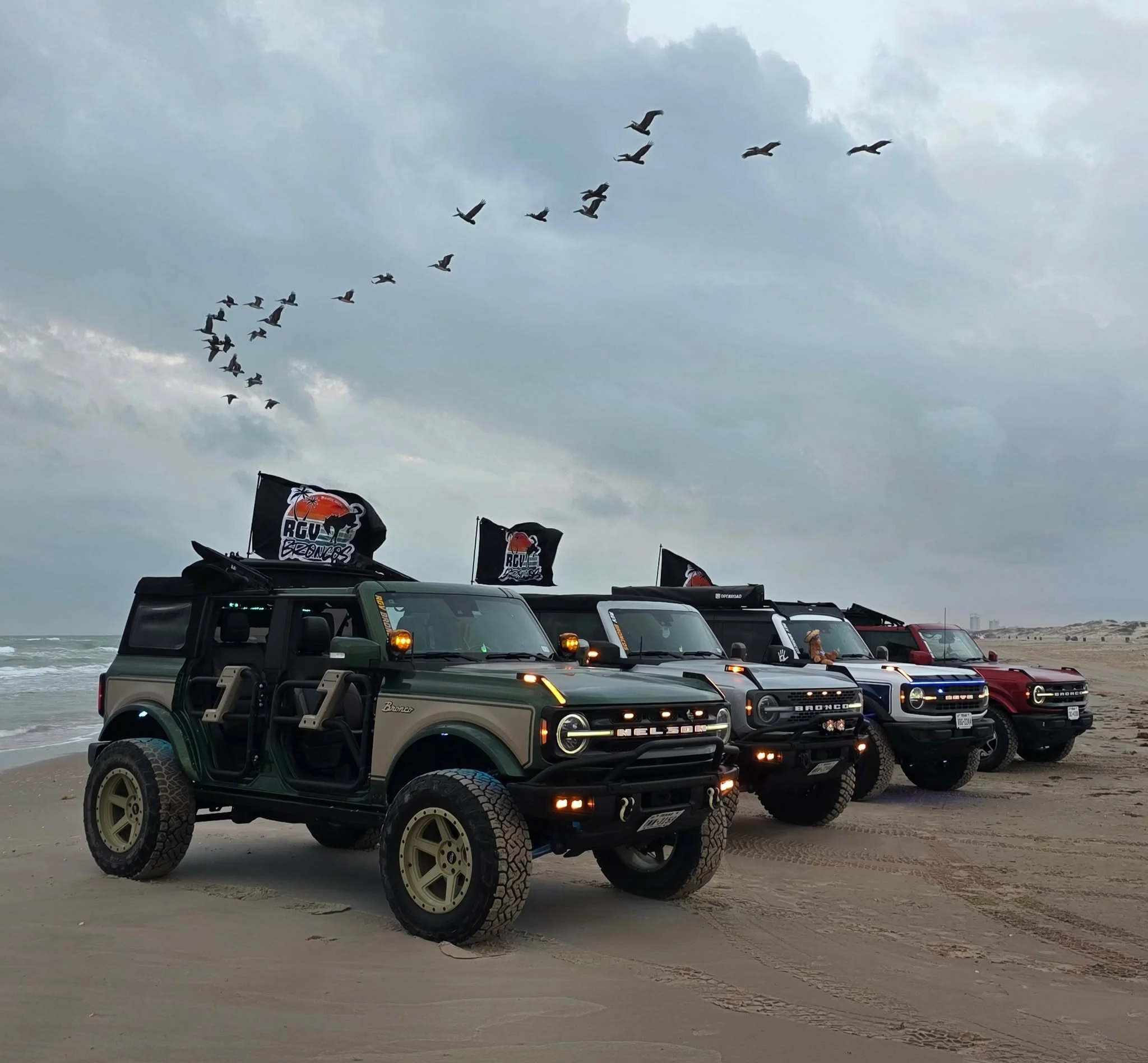 RGV Broncos lined up on the South Texas coast beneath a flock of birds